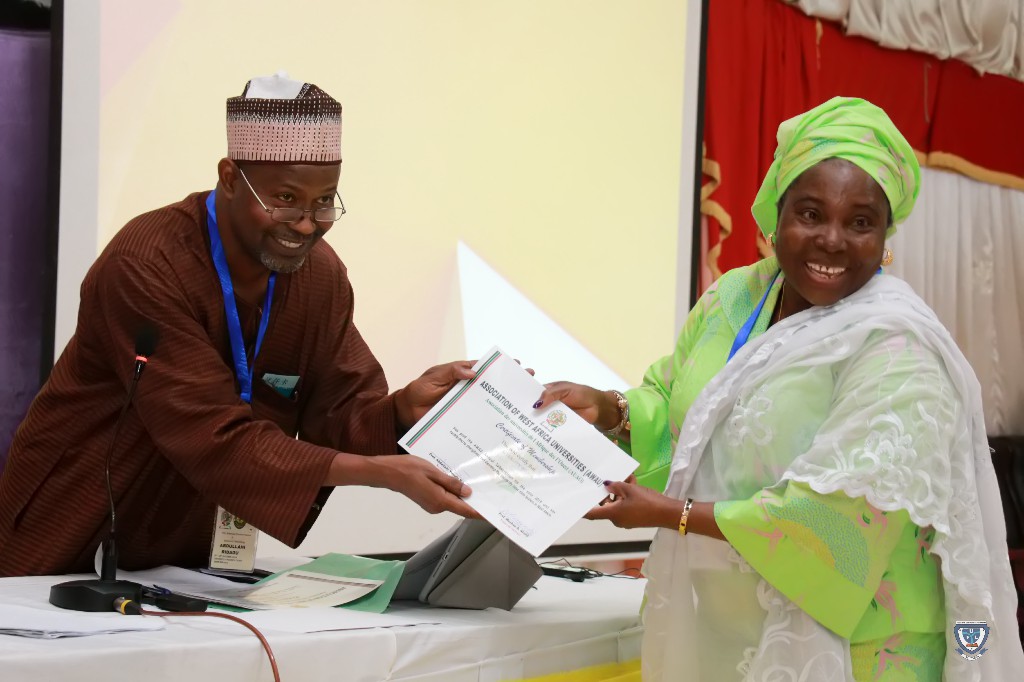 Presentation of Certificate to the Vice-Chancellor, Prof. Angela F. Miri during the 7th Conference and 9th AGM of the Association of West Africa Universities held in Benin Republic