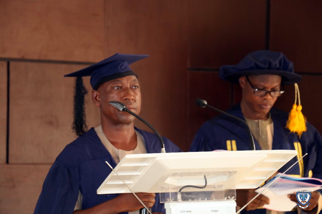 Dr. M. Y. Abdullahi, Ag. HOD, History and Int'l Studies representing the Dean of Arts and Social Sciences, Professor David Irefin, presenting matriculating students of the Faculty for Oath taking